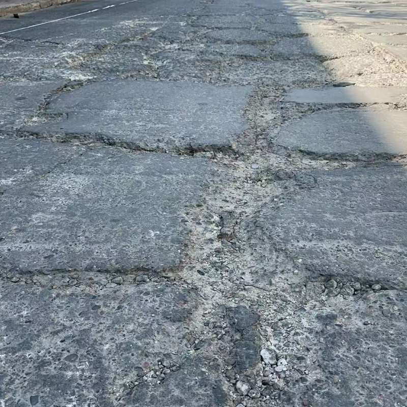 罗庄路面起砂露石子修补料